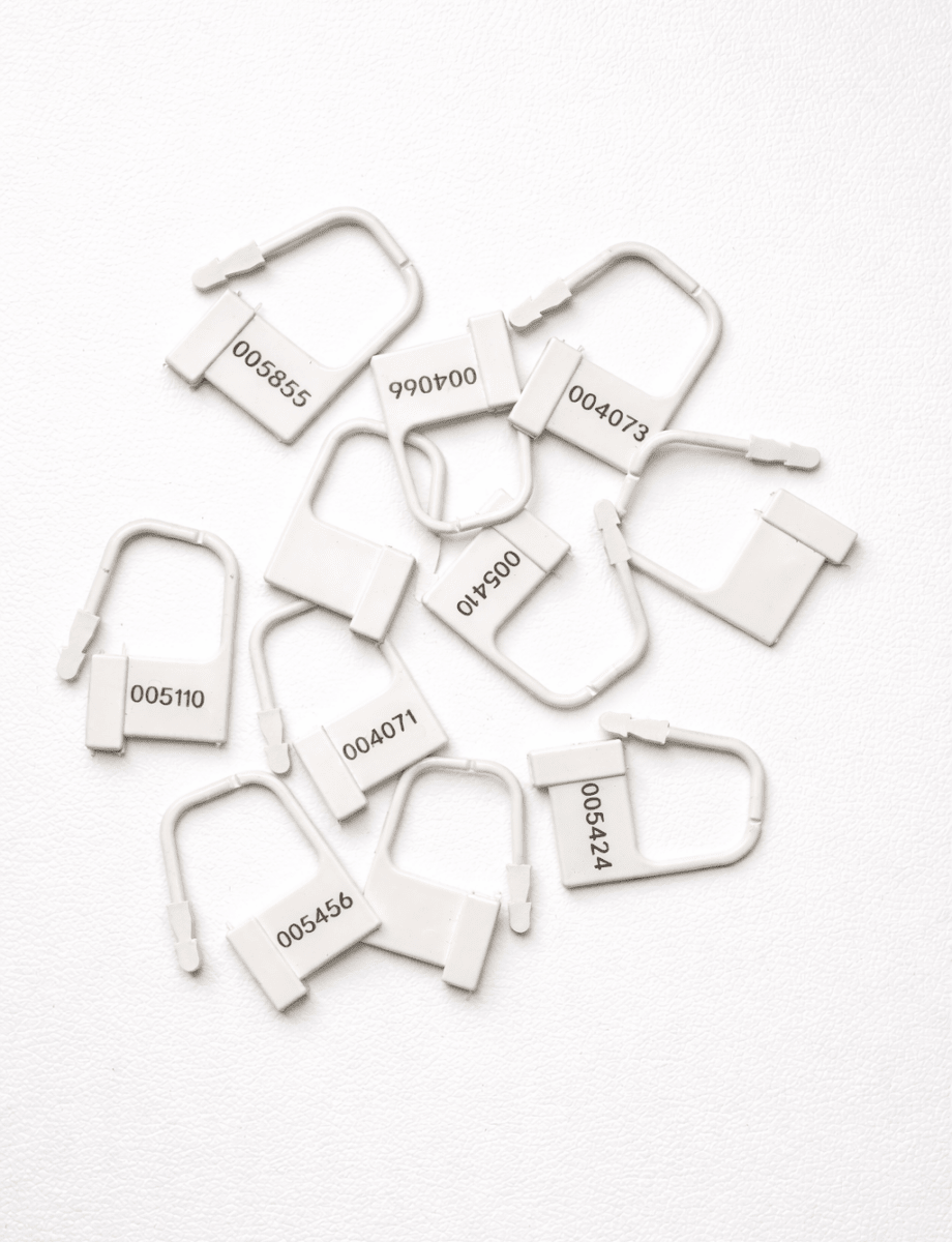 White Chastity Disposable Padlocks - Numbered Cage Locks - SubWoofs